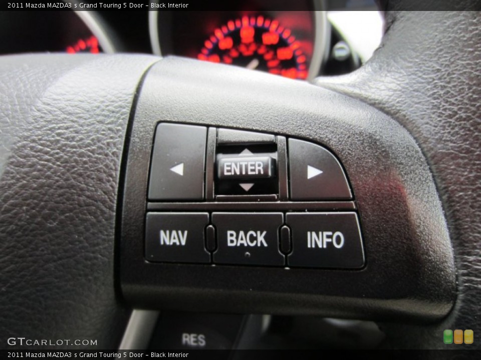 Black Interior Controls for the 2011 Mazda MAZDA3 s Grand Touring 5 Door #55511576