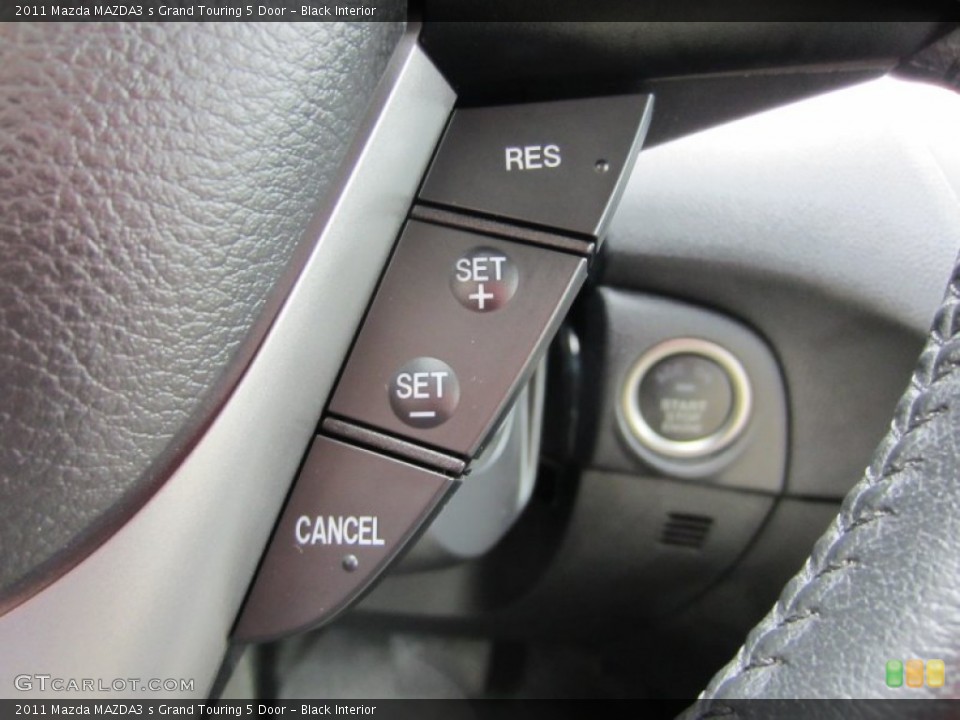 Black Interior Controls for the 2011 Mazda MAZDA3 s Grand Touring 5 Door #55511588