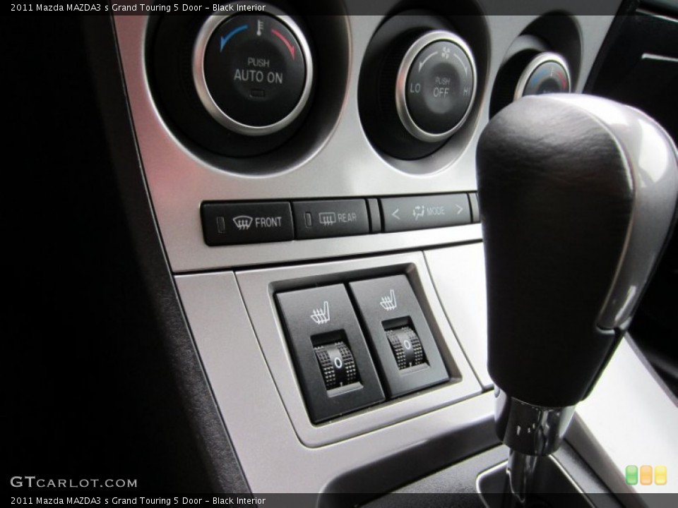 Black Interior Controls for the 2011 Mazda MAZDA3 s Grand Touring 5 Door #55511606