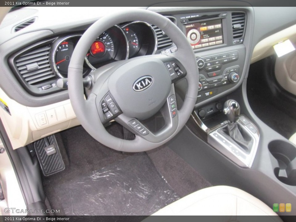 Beige Interior Dashboard for the 2011 Kia Optima EX #55524896
