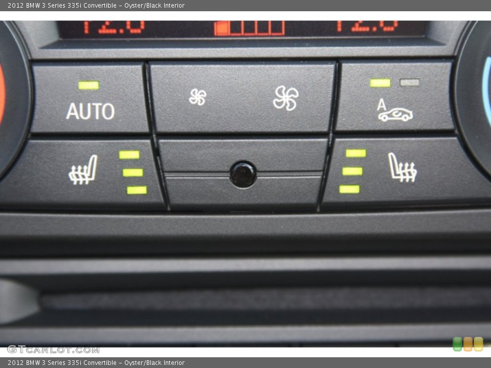 Oyster/Black Interior Controls for the 2012 BMW 3 Series 335i Convertible #55537827