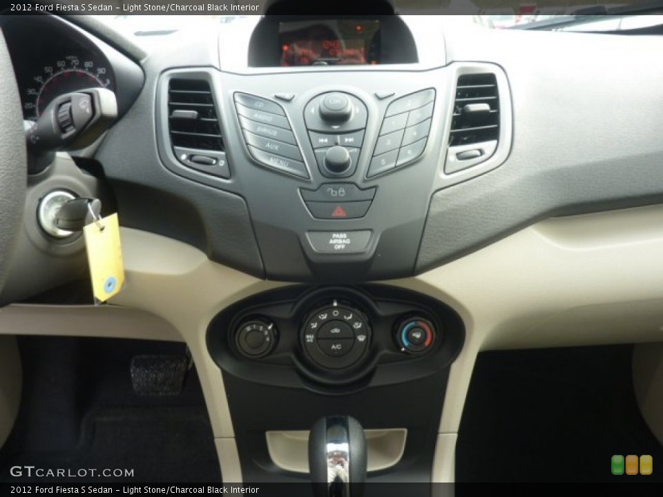 Light Stone/Charcoal Black Interior Controls for the 2012 Ford Fiesta S Sedan #55538532
