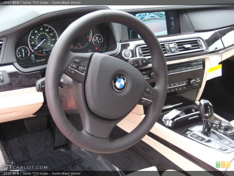 Oyster/Black Interior Steering Wheel for the 2012 BMW 7 Series 750i Sedan #55546830