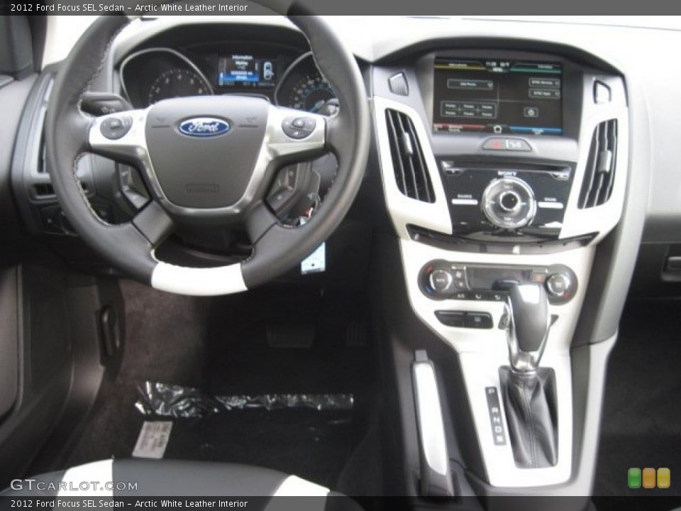 Arctic White Leather Interior Dashboard for the 2012 Ford Focus SEL Sedan #55584061