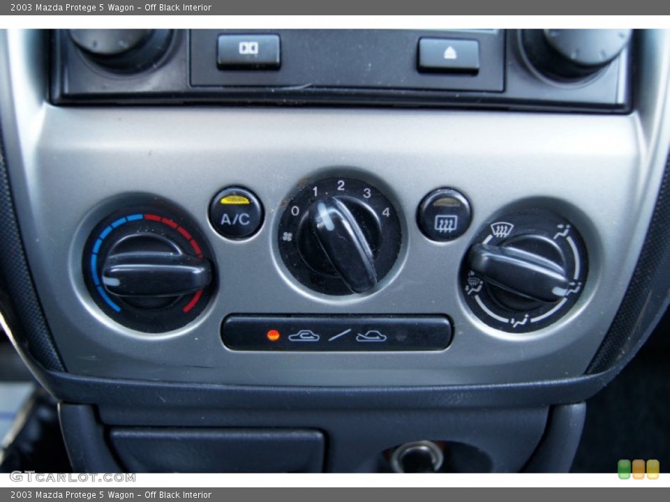 Off Black Interior Controls for the 2003 Mazda Protege 5 Wagon #55589536