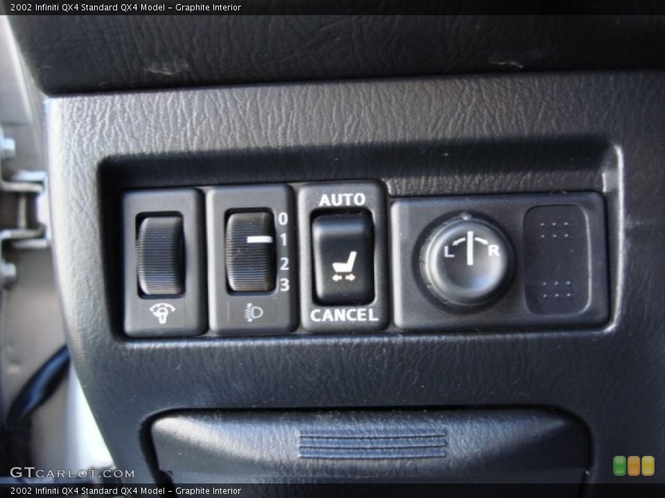 Graphite Interior Controls for the 2002 Infiniti QX4  #55599529