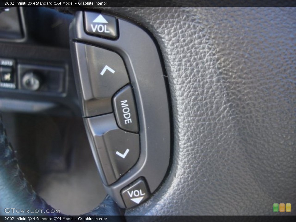 Graphite Interior Controls for the 2002 Infiniti QX4  #55599535
