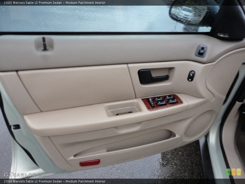 Medium Parchment Interior Door Panel for the 2003 Mercury Sable LS Premium Sedan #55623386