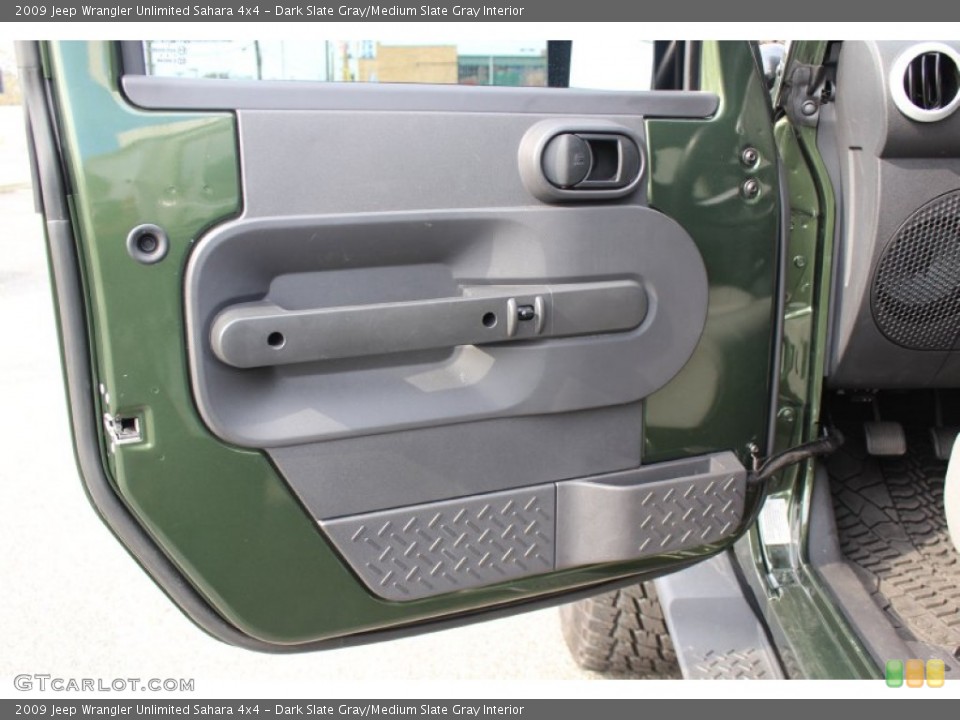 Dark Slate Gray/Medium Slate Gray Interior Door Panel for the 2009 Jeep Wrangler Unlimited Sahara 4x4 #55630907