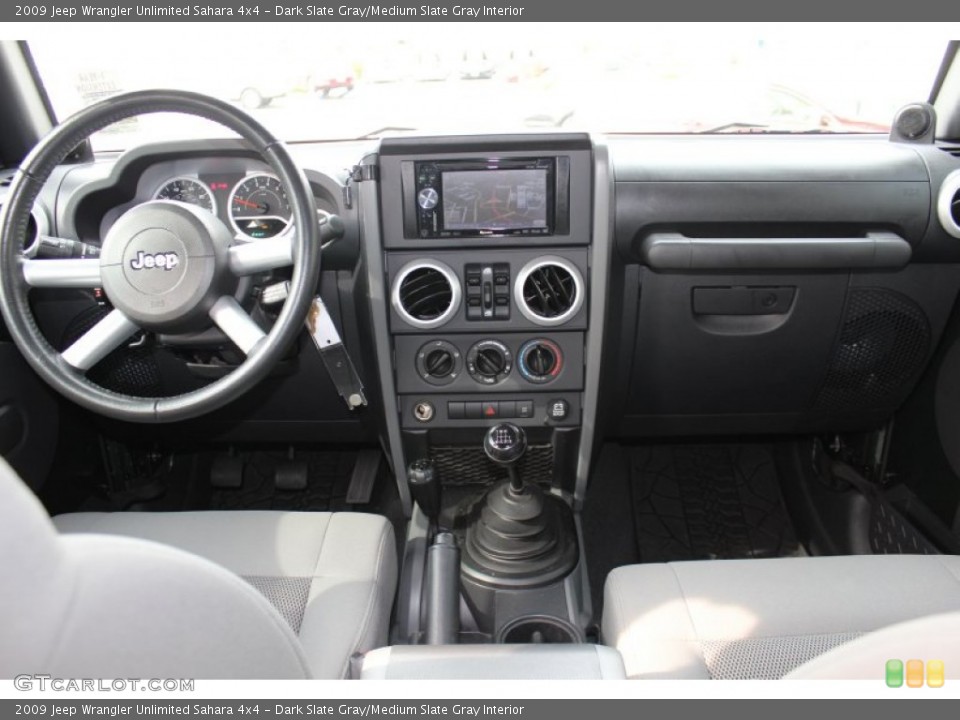 Dark Slate Gray/Medium Slate Gray Interior Dashboard for the 2009 Jeep Wrangler Unlimited Sahara 4x4 #55630943