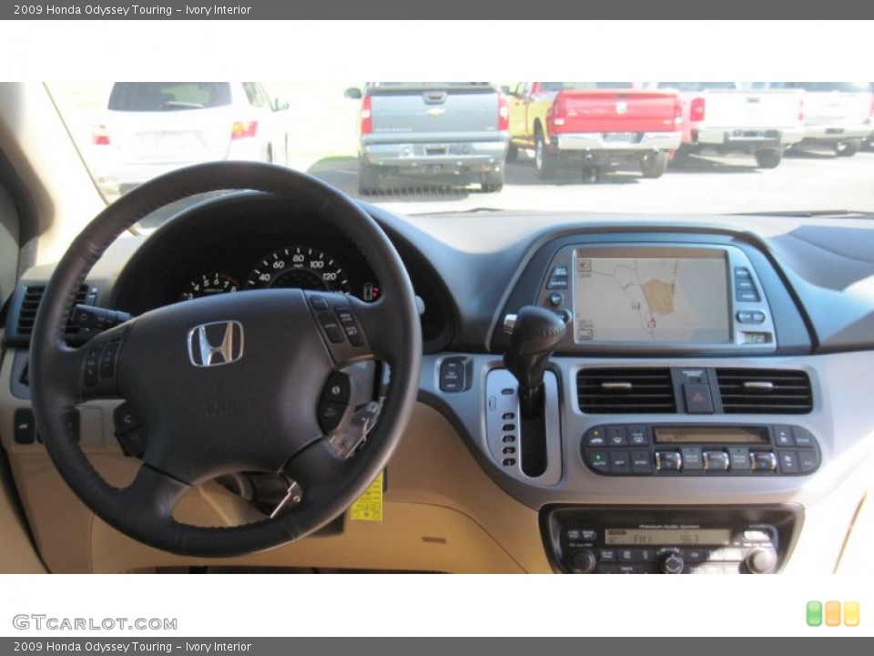 Ivory Interior Dashboard for the 2009 Honda Odyssey Touring #55640375