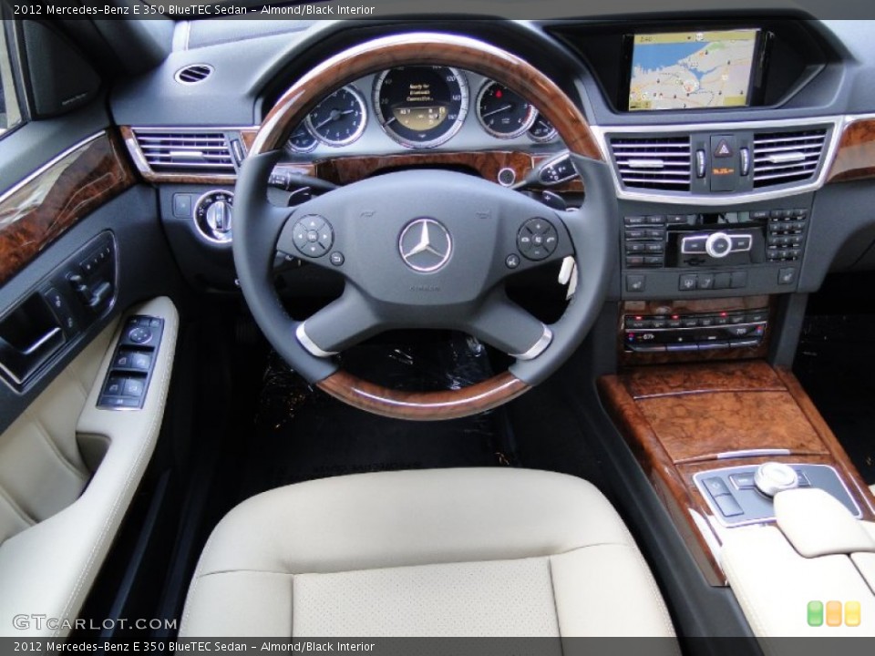 Almond/Black Interior Dashboard for the 2012 Mercedes-Benz E 350 BlueTEC Sedan #55642754