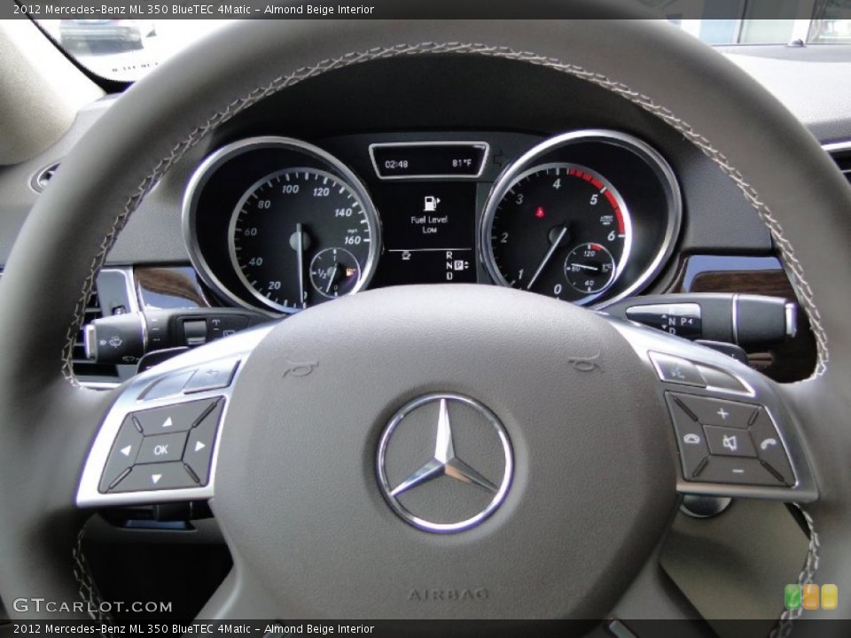 Almond Beige Interior Steering Wheel for the 2012 Mercedes-Benz ML 350 BlueTEC 4Matic #55643384