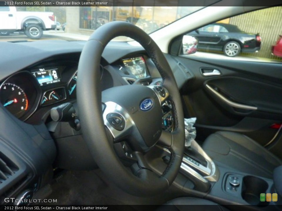 Charcoal Black Leather Interior Steering Wheel for the 2012 Ford Focus SEL Sedan #55650470