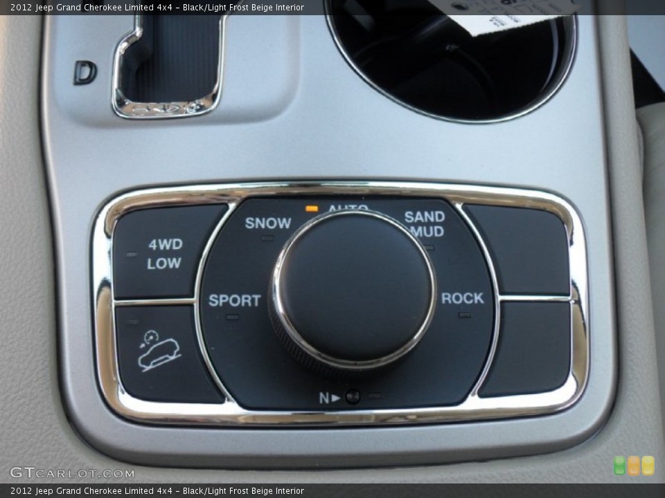 Black/Light Frost Beige Interior Controls for the 2012 Jeep Grand Cherokee Limited 4x4 #55654088