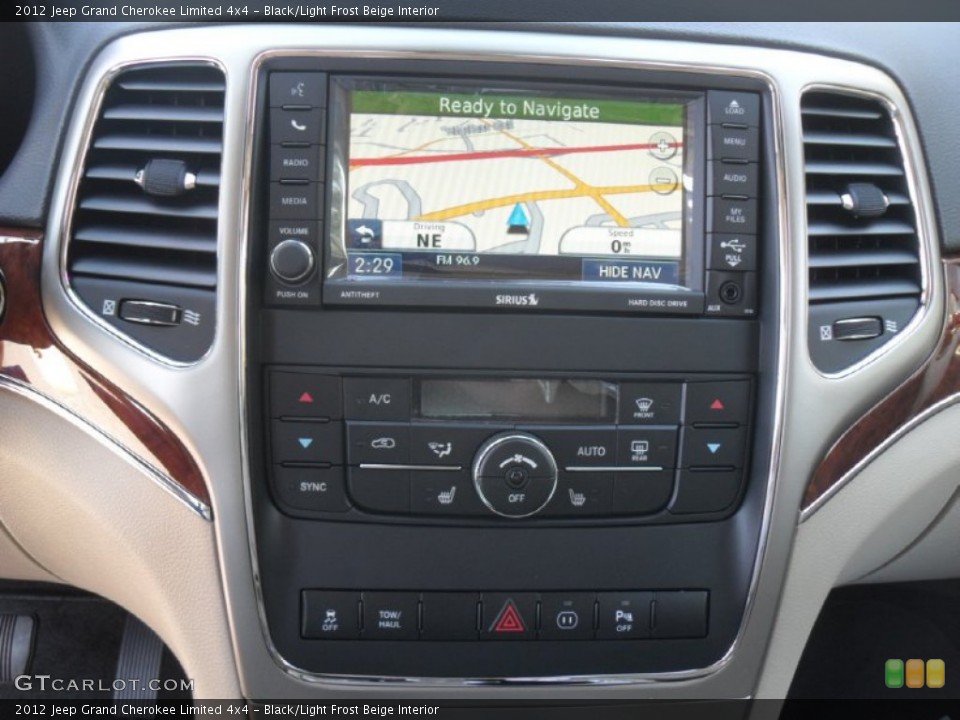 Black/Light Frost Beige Interior Controls for the 2012 Jeep Grand Cherokee Limited 4x4 #55654094