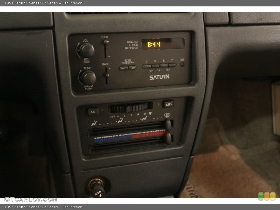 Tan Interior Controls for the 1994 Saturn S Series SL2 Sedan #55658664