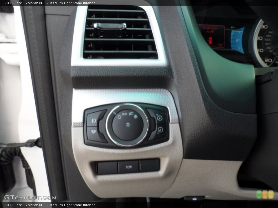 Medium Light Stone Interior Controls for the 2012 Ford Explorer XLT #55662390