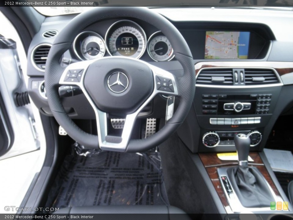 Black Interior Dashboard for the 2012 Mercedes-Benz C 250 Sport #55675882