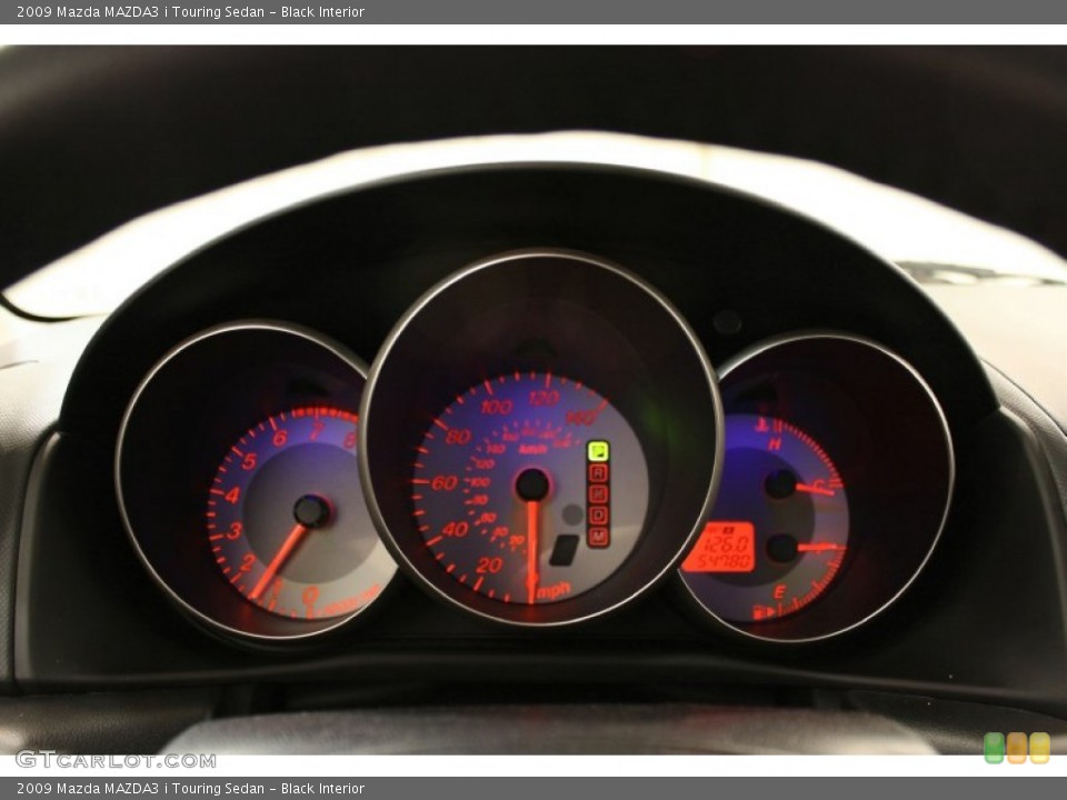 Black Interior Gauges for the 2009 Mazda MAZDA3 i Touring Sedan #55700960