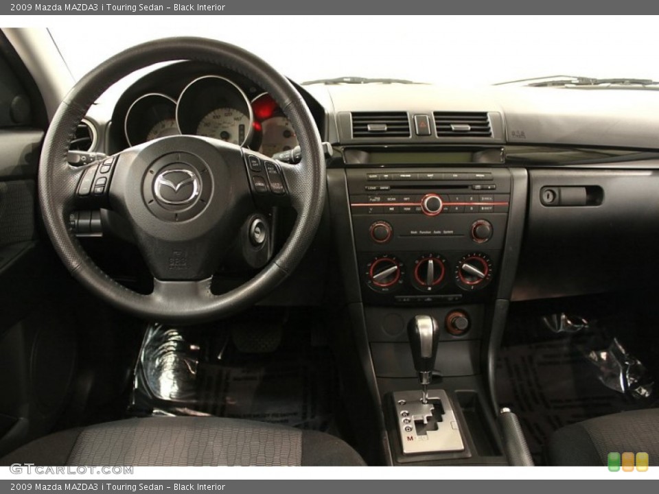 Black Interior Dashboard for the 2009 Mazda MAZDA3 i Touring Sedan #55701023
