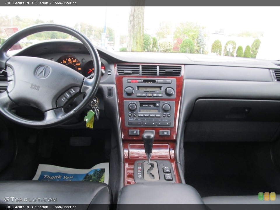 Ebony Interior Dashboard for the 2000 Acura RL 3.5 Sedan #55767539