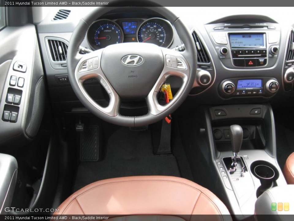 Black/Saddle Interior Dashboard for the 2011 Hyundai Tucson Limited AWD #55776667