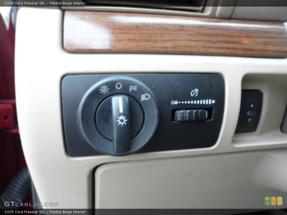 Pebble Beige Interior Controls for the 2005 Ford Freestar SEL #55803191