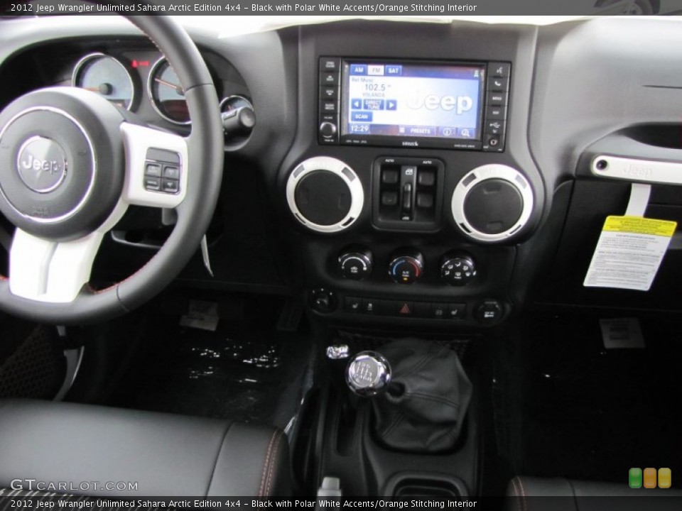 Black with Polar White Accents/Orange Stitching Interior Dashboard for the 2012 Jeep Wrangler Unlimited Sahara Arctic Edition 4x4 #55806338