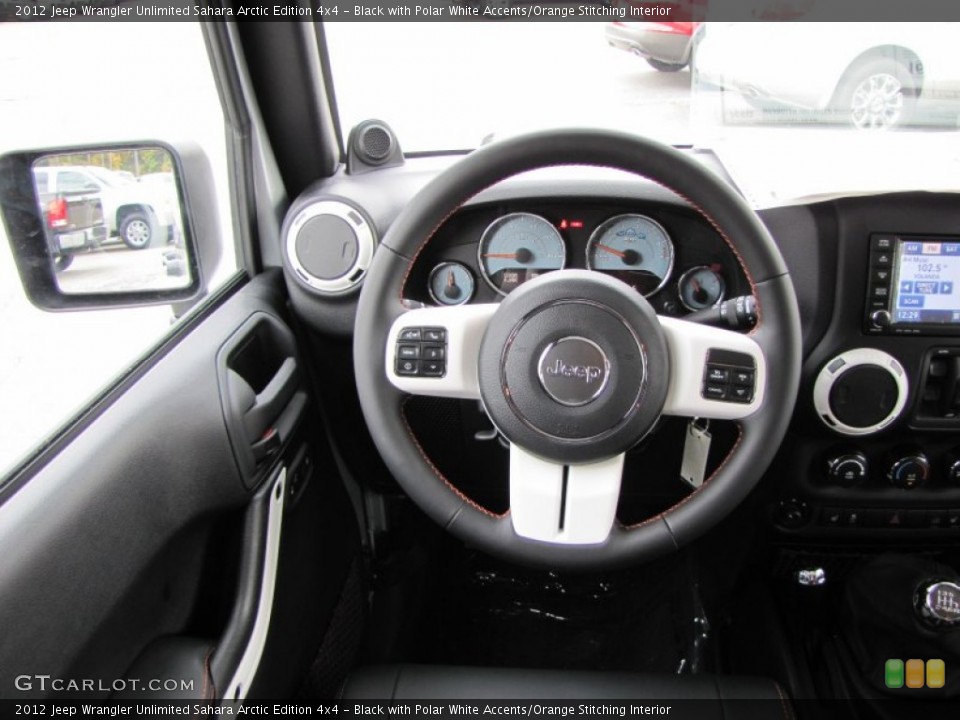 Black with Polar White Accents/Orange Stitching Interior Steering Wheel for the 2012 Jeep Wrangler Unlimited Sahara Arctic Edition 4x4 #55806345