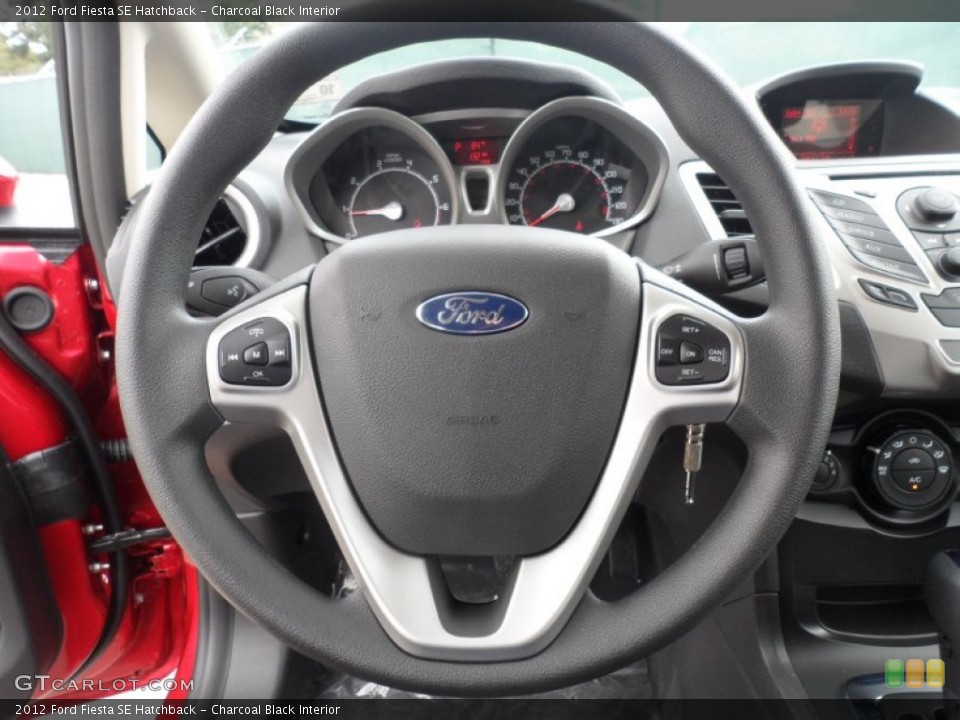 Charcoal Black Interior Steering Wheel for the 2012 Ford Fiesta SE Hatchback #55818550
