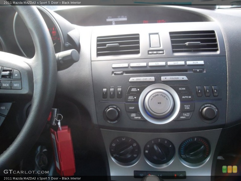 Black Interior Controls for the 2011 Mazda MAZDA3 s Sport 5 Door #55824962