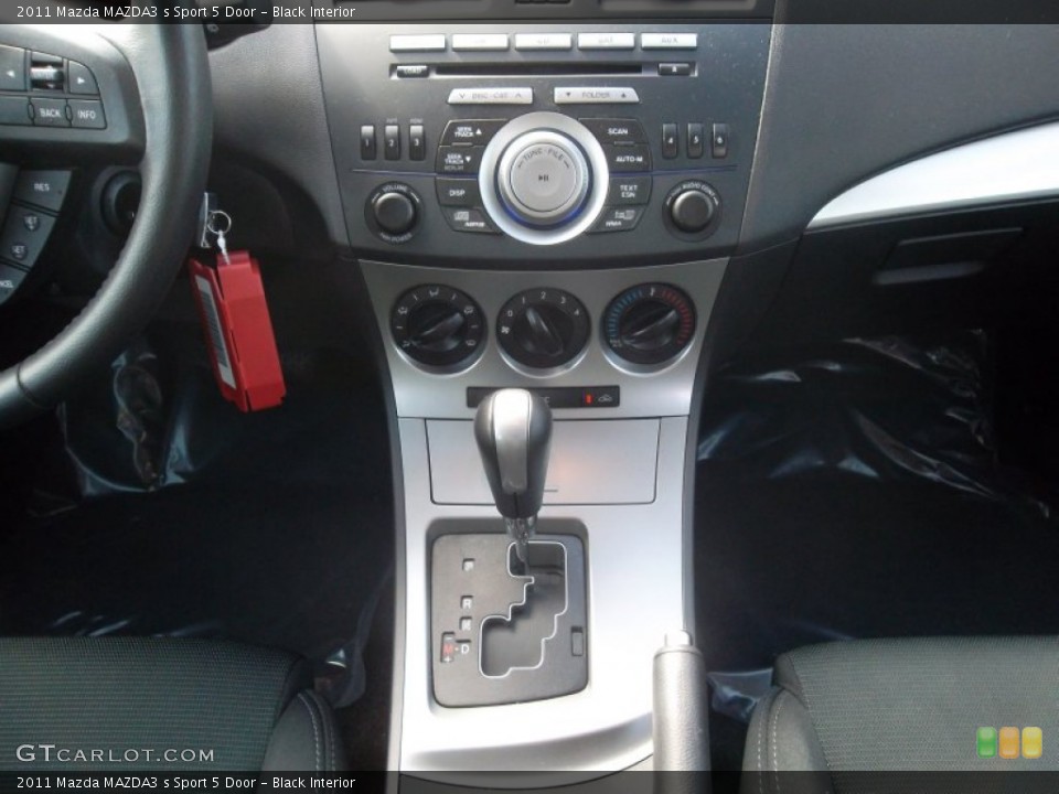 Black Interior Controls for the 2011 Mazda MAZDA3 s Sport 5 Door #55824971