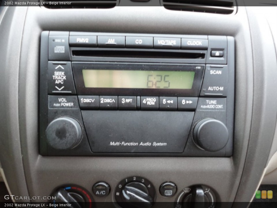 Beige Interior Audio System for the 2002 Mazda Protege LX #55827968