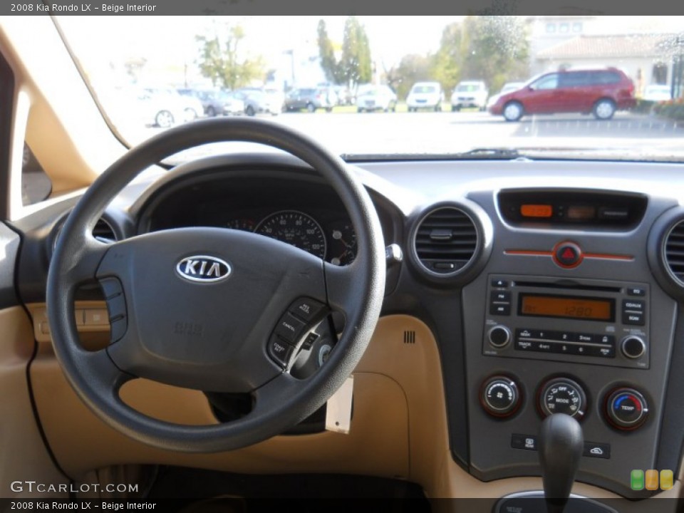 Beige Interior Dashboard for the 2008 Kia Rondo LX #55851837