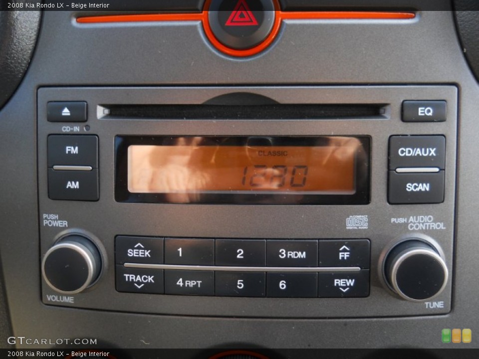Beige Interior Audio System for the 2008 Kia Rondo LX #55851846