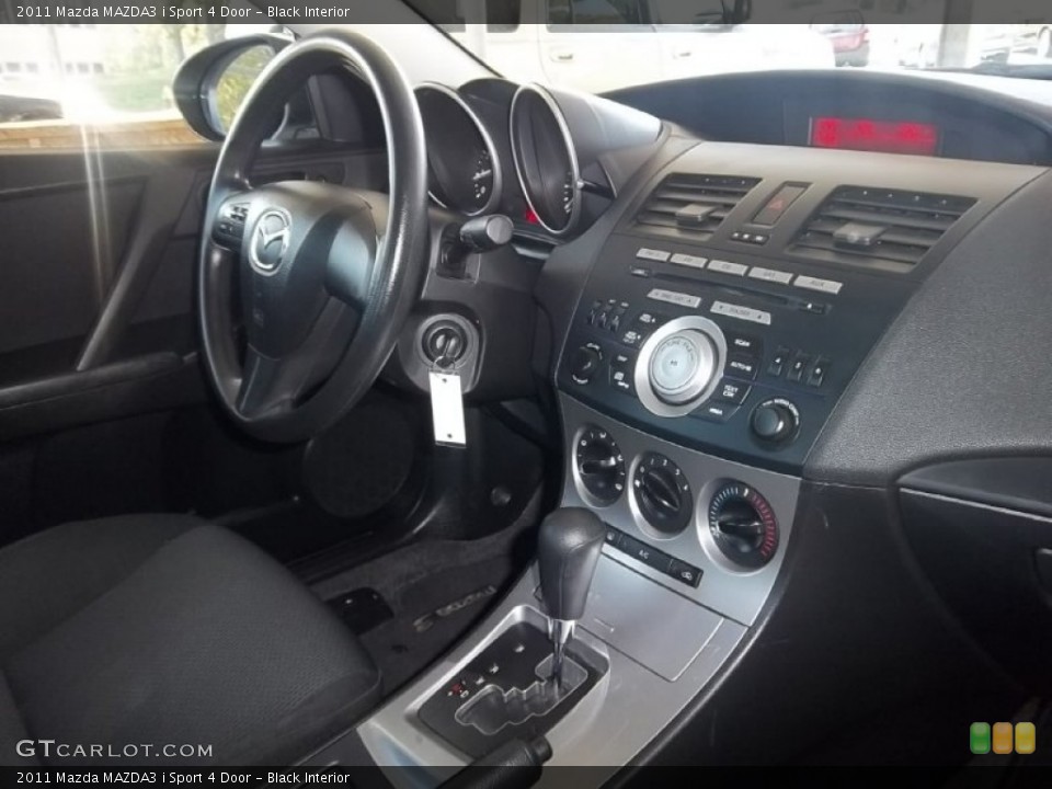 Black Interior Controls for the 2011 Mazda MAZDA3 i Sport 4 Door #55866298