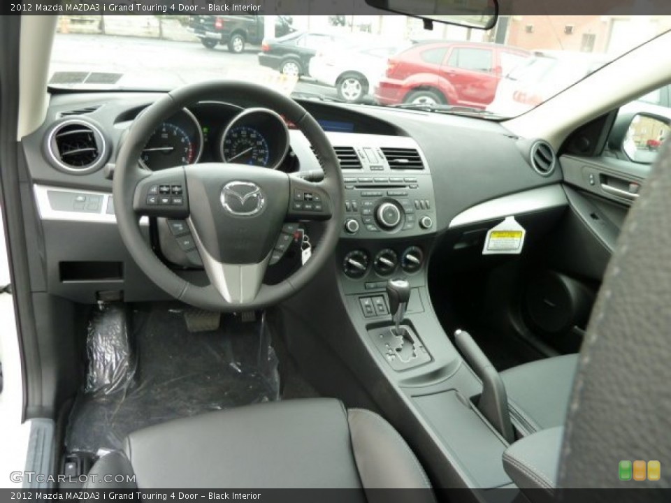 Black Interior Dashboard for the 2012 Mazda MAZDA3 i Grand Touring 4 Door #55885087