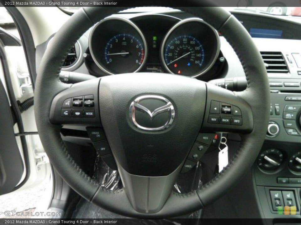 Black Interior Steering Wheel for the 2012 Mazda MAZDA3 i Grand Touring 4 Door #55885126