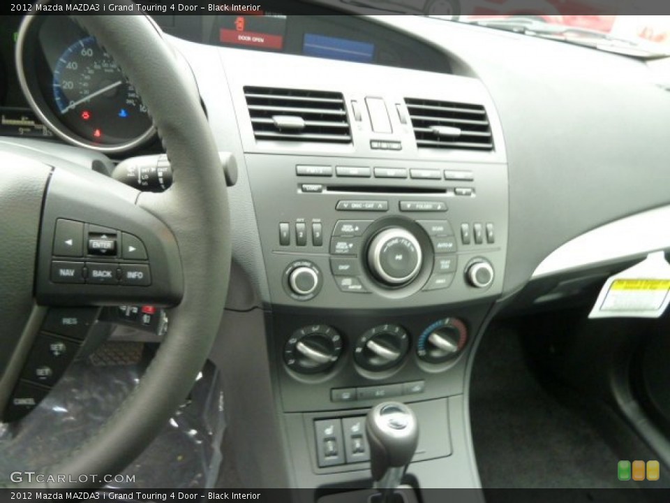 Black Interior Controls for the 2012 Mazda MAZDA3 i Grand Touring 4 Door #55885135