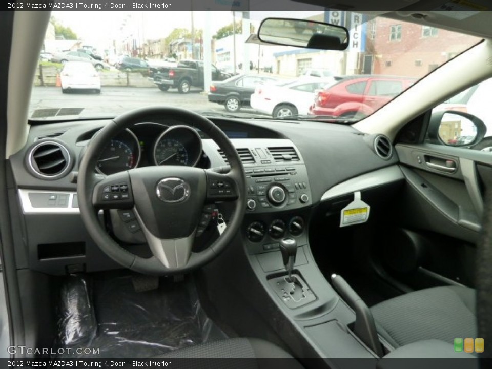 Black Interior Dashboard for the 2012 Mazda MAZDA3 i Touring 4 Door #55885267