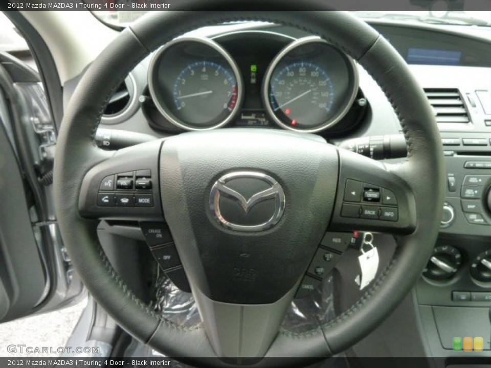Black Interior Steering Wheel for the 2012 Mazda MAZDA3 i Touring 4 Door #55885300
