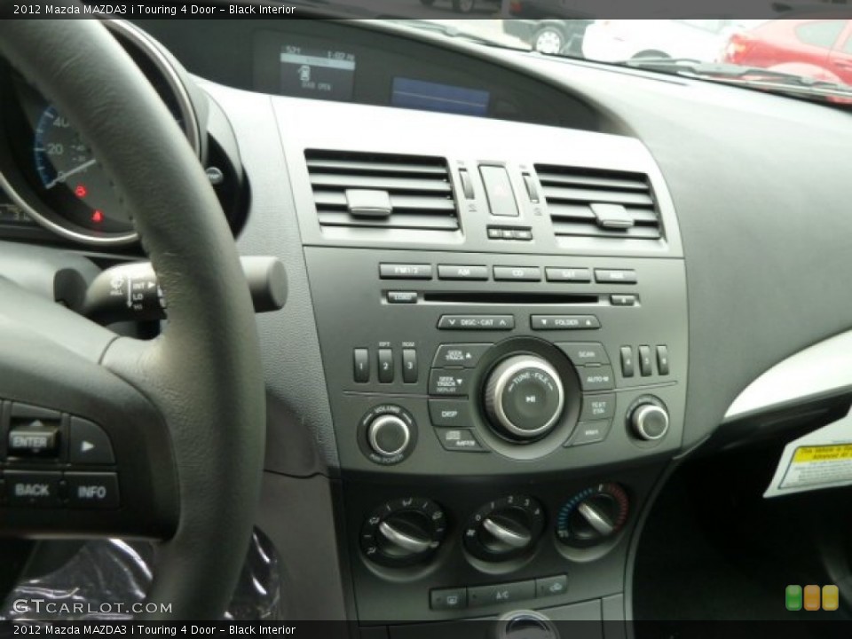 Black Interior Controls for the 2012 Mazda MAZDA3 i Touring 4 Door #55885317