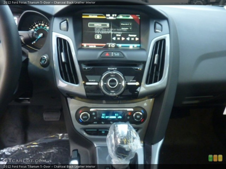 Charcoal Black Leather Interior Controls for the 2012 Ford Focus Titanium 5-Door #55889437