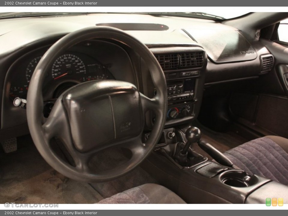 Ebony Black Interior Dashboard for the 2002 Chevrolet Camaro Coupe #55945522