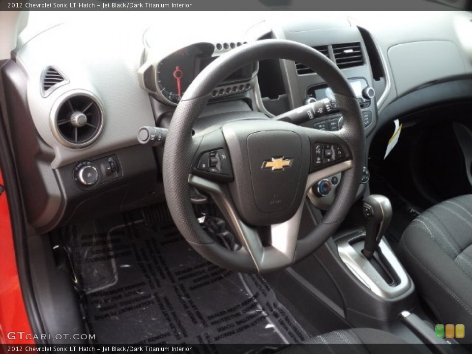 Jet Black/Dark Titanium Interior Steering Wheel for the 2012 Chevrolet Sonic LT Hatch #55947895