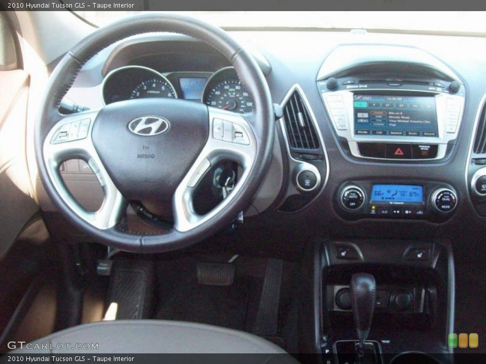 Taupe Interior Dashboard for the 2010 Hyundai Tucson GLS #55964610