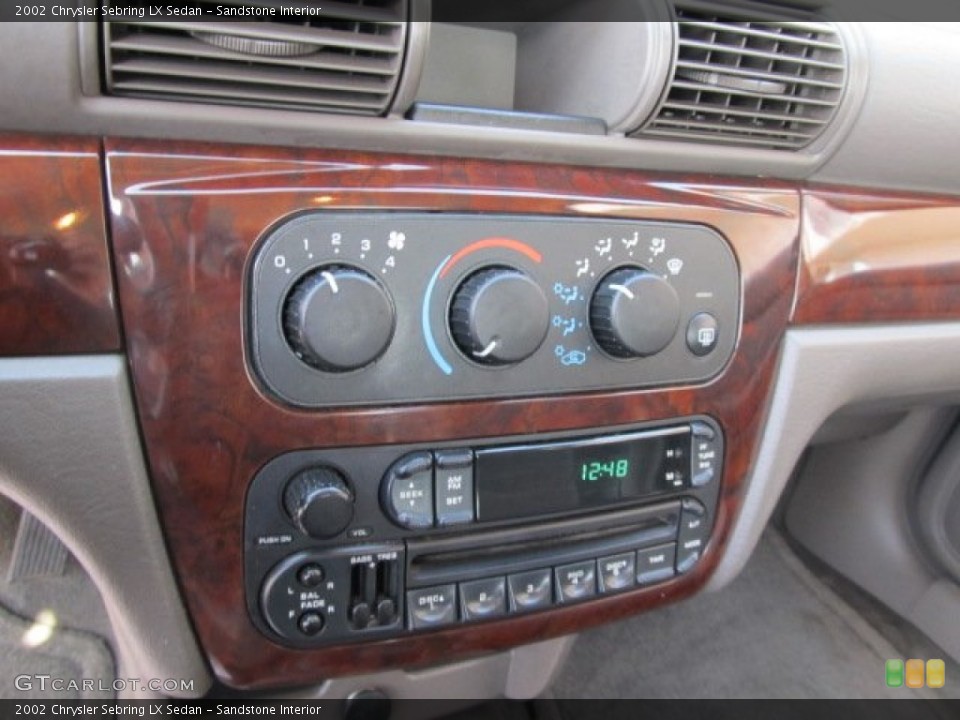 Sandstone Interior Controls for the 2002 Chrysler Sebring LX Sedan #55967312