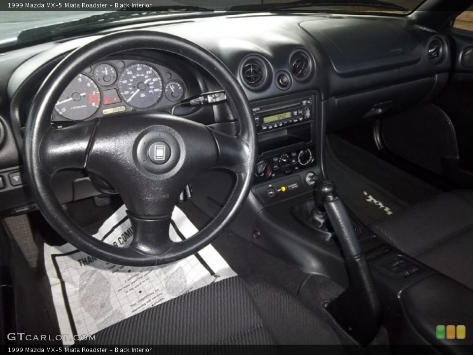 Black Interior Dashboard for the 1999 Mazda MX-5 Miata Roadster #55978705