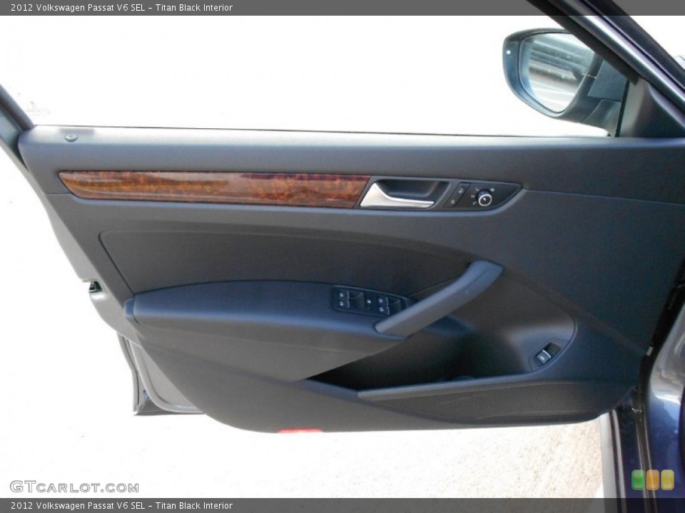 Titan Black Interior Door Panel for the 2012 Volkswagen Passat V6 SEL #55980847